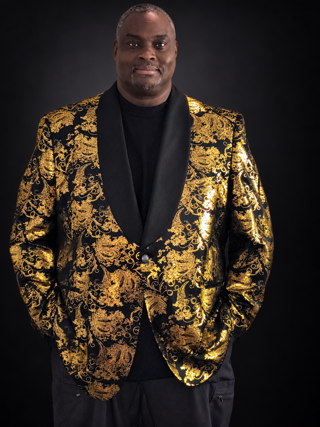 Dre, President of Boxing Operations, in a gold jacket